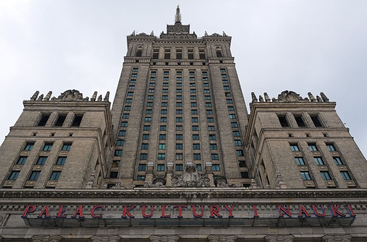 The Palace of Culture and Science seen from below, with its name across the entrance